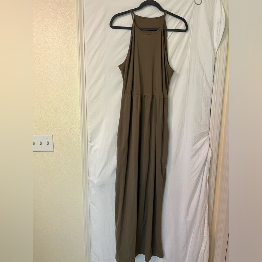 Long spaghetti strap dress with pockets.